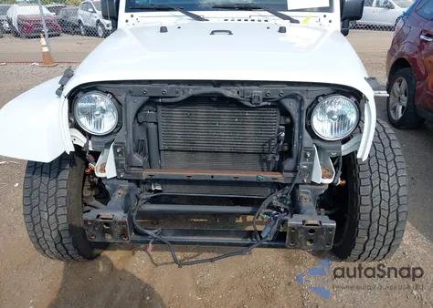 2016 Jeep Wrangler Unlimited Sahara z USA, uszkodzony, nr VIN 1C4BJWEG5GL311687